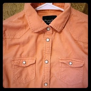 American Eagle coral colored button up shirt